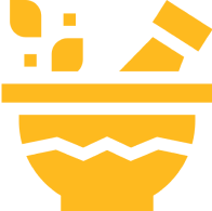 Yellow mortar and pestle on black background.