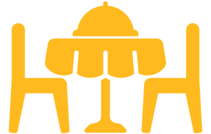 Yellow dining icon with table and chairs.