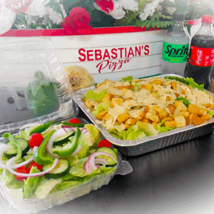 Takeout meal with salad, chicken pasta, and soda from Sebastian's Pizzeria.